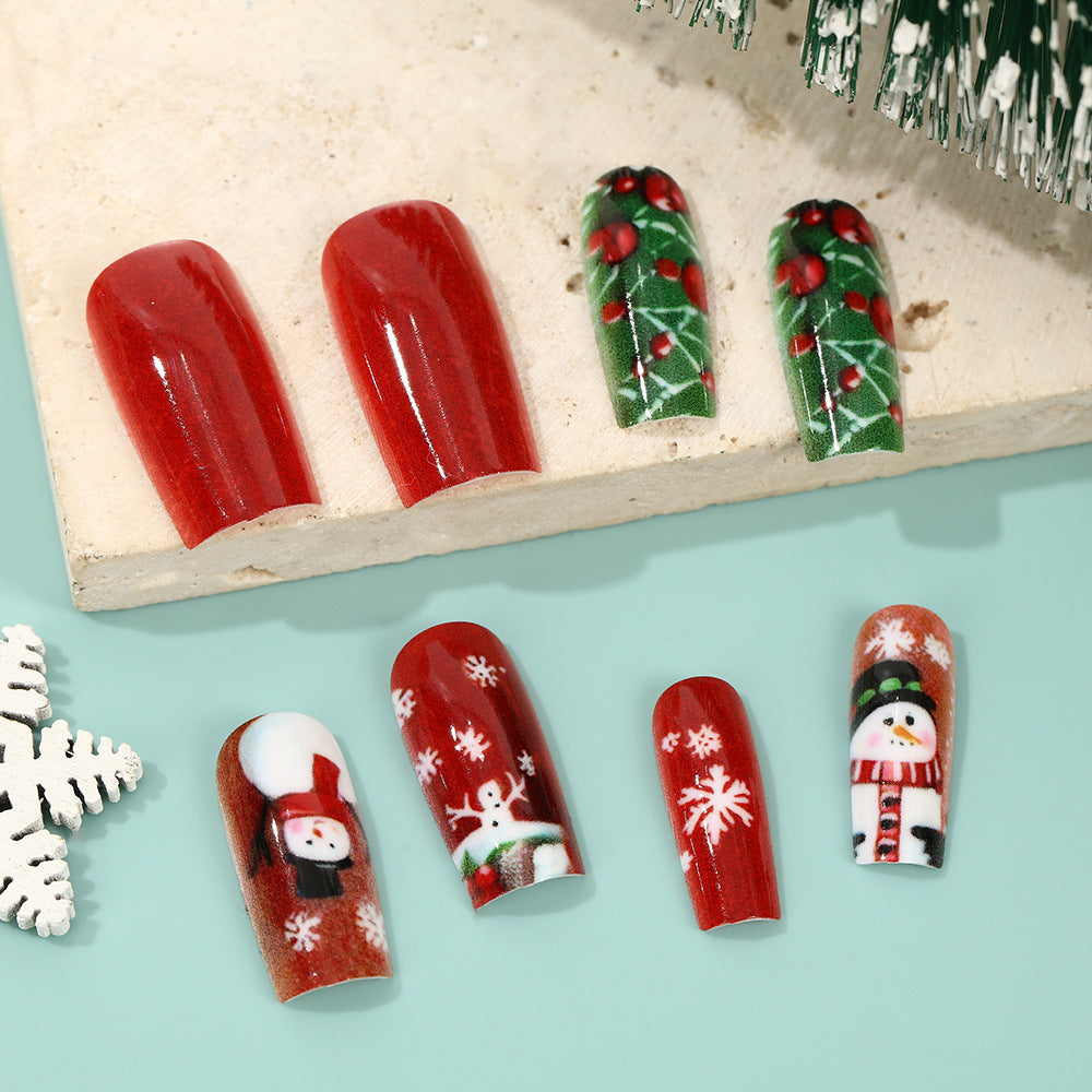 Festliche Kunstnägel mit Weihnachtsmotiven Karnz