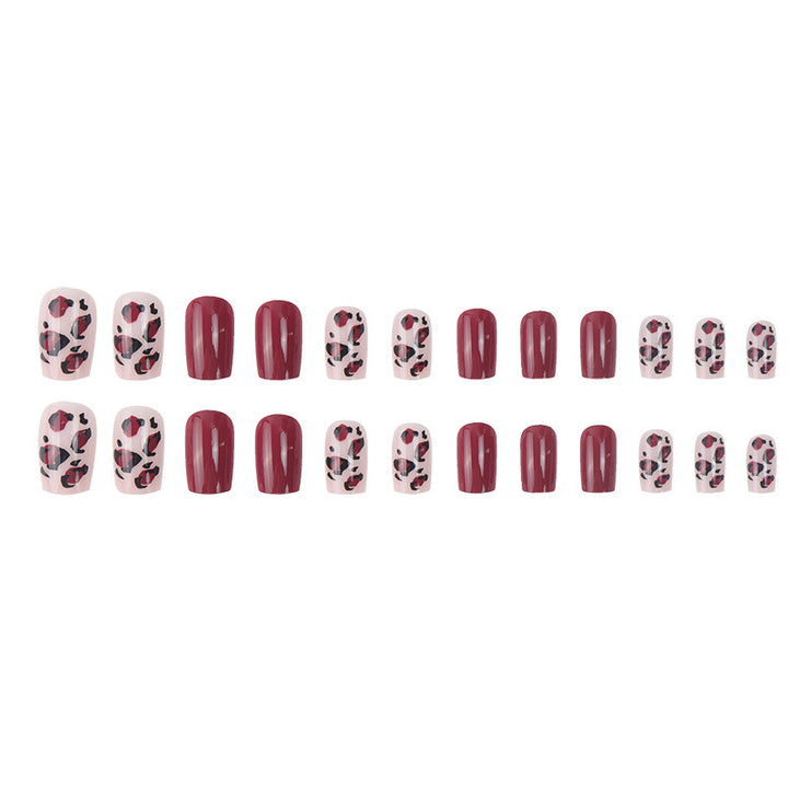 Künstlerisches kurzes Press-On-Nagelset mit Leopardenmuster und glänzendem Finish Karnz