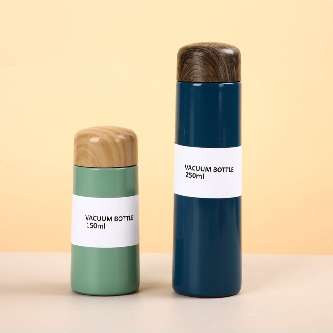 Damen vakuumisolierte Wasserflasche mit innovativem Holzdeckel Karnz