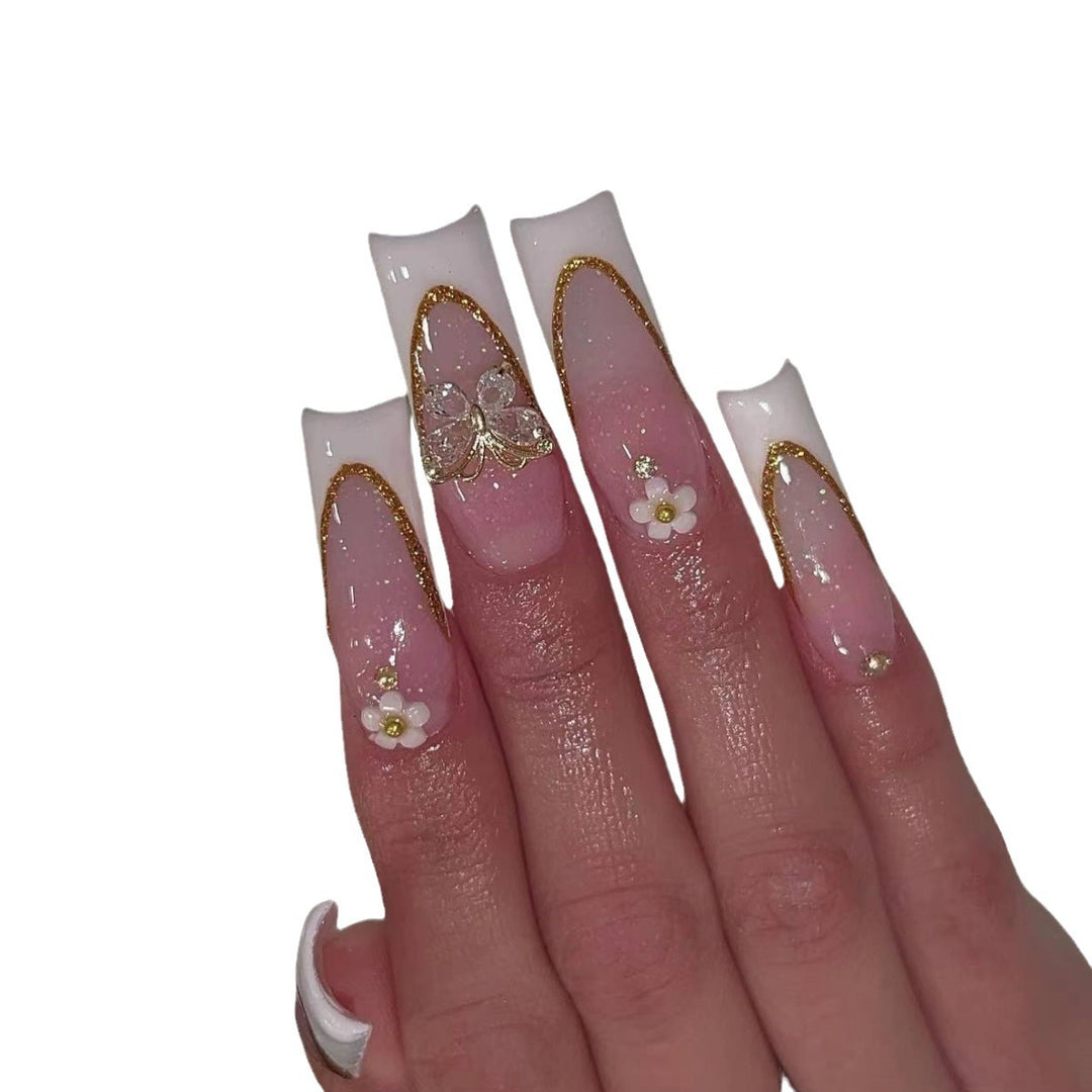 Elegante gold-akzentuierte Stiletto-Nagelerweiterungen Karnz
