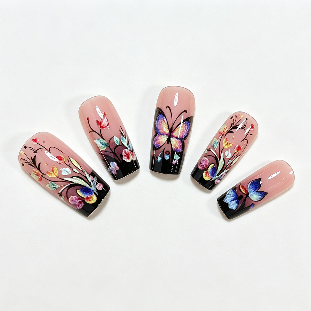 Künstlerische Blumen- und Schmetterlings-Press-On-Nagelkunst Karnz
