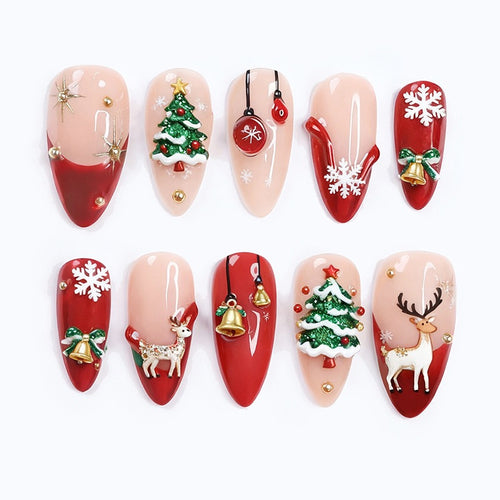 Kunstnagelset mit festlichen Motiven und Glitzerelementen Karnz