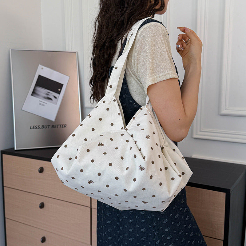 Moderne gepunktete Schultertasche