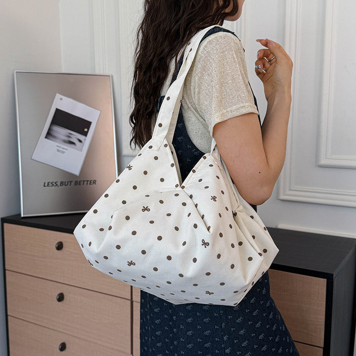 Moderne gepunktete Schultertasche
