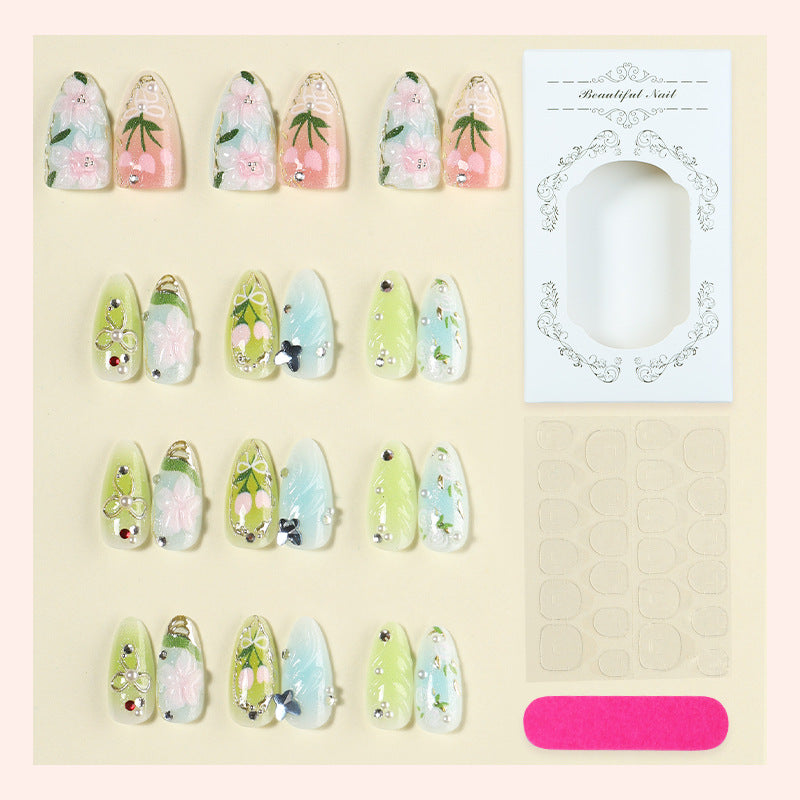 Florale artikulierte Press-On Nagelset Karnz