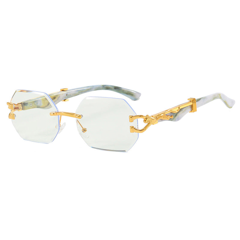 Damen modische Sonnenbrille mit extravagantem achteckigem Design und goldenen Akzenten Karnz