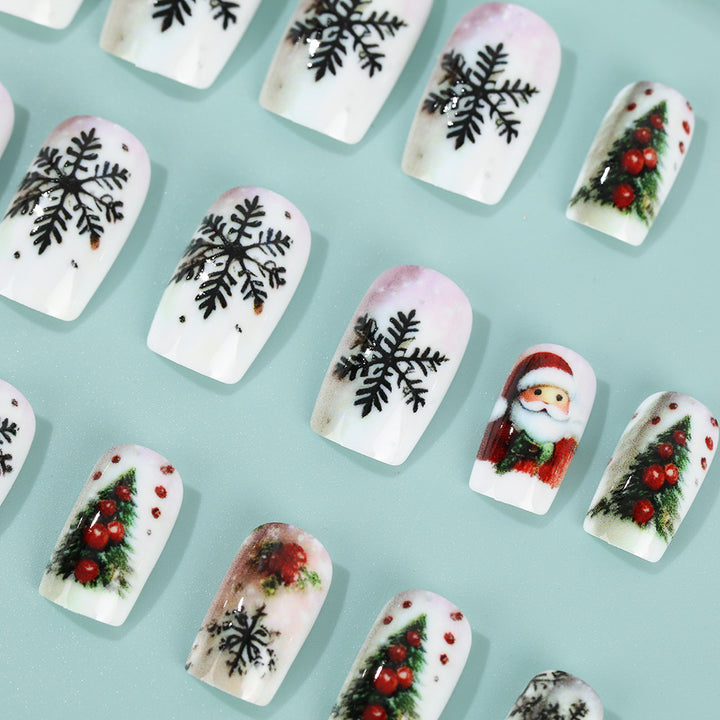 Festliche Kunstnägel mit Weihnachtsmotiven Karnz