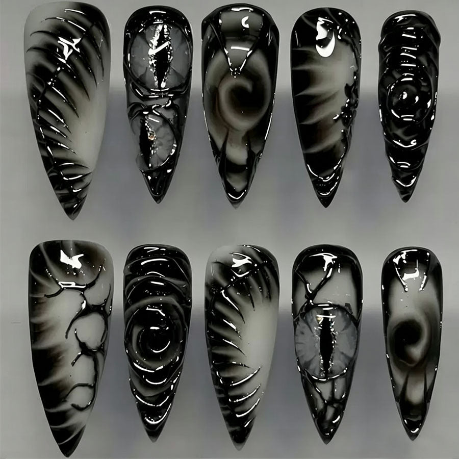 Künstlerisches Stiletto Press-On Nagelset Karnz