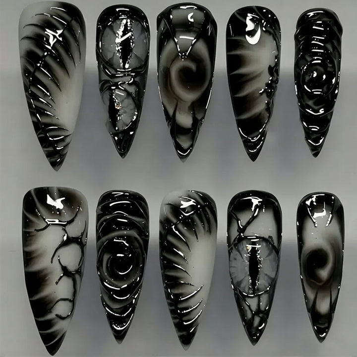 Künstlerisches Stiletto Press-On Nagelset Karnz