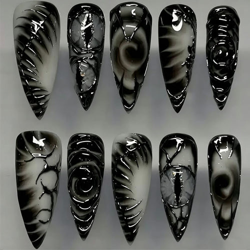 Künstlerisches Stiletto Press-On Nagelset Karnz