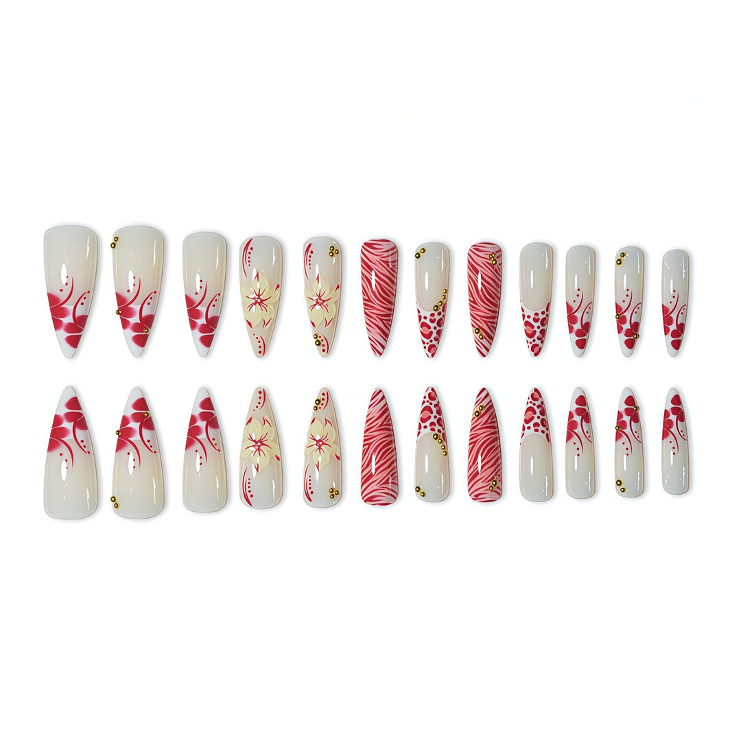 Elegante Stiletto-Nagelerweiterungen mit floralen und Tierdruckdesigns Karnz