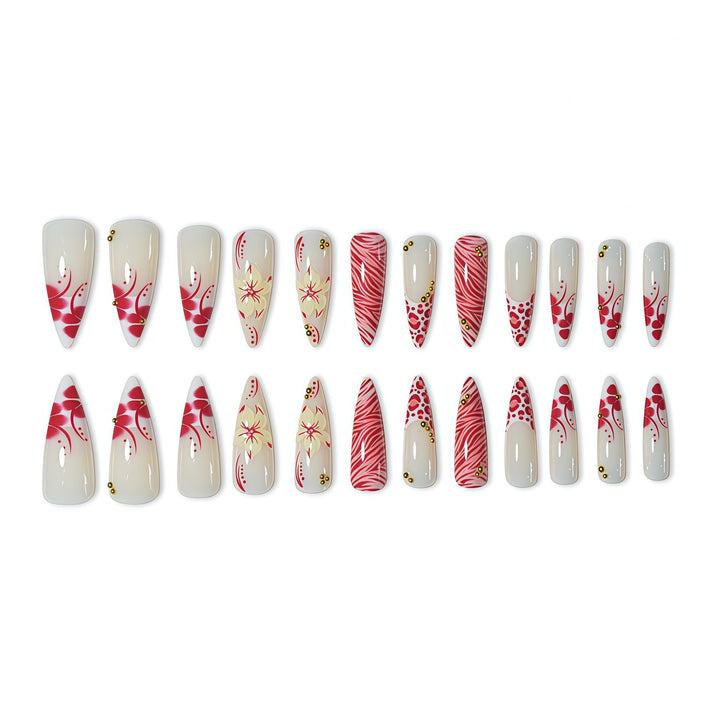 Elegante Stiletto-Nagelerweiterungen mit floralen und Tierdruckdesigns Karnz
