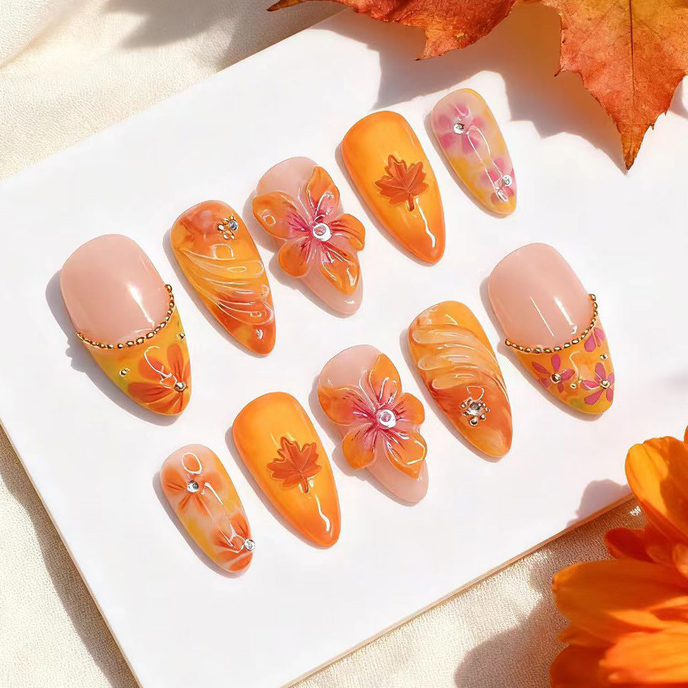 Künstlerisches, blumenmotiviertes Press-On Nail Set Karnz