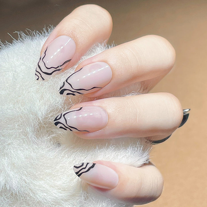 Elegantes Stiletto Press-On Nagelset mit Marmor-Details Karnz