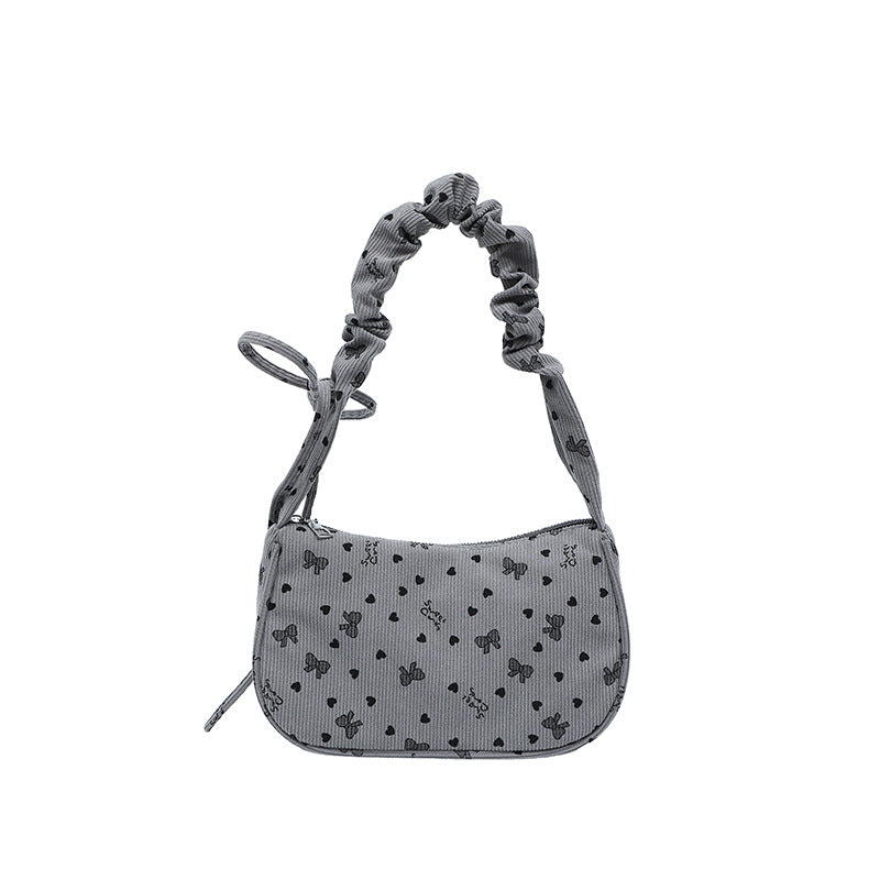 WoPlayful gemusterte Mini-Handtasche Karnz