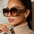 Damen quadratische Sonnenbrille mit innovativem transparenter Rahmendesign Karnz