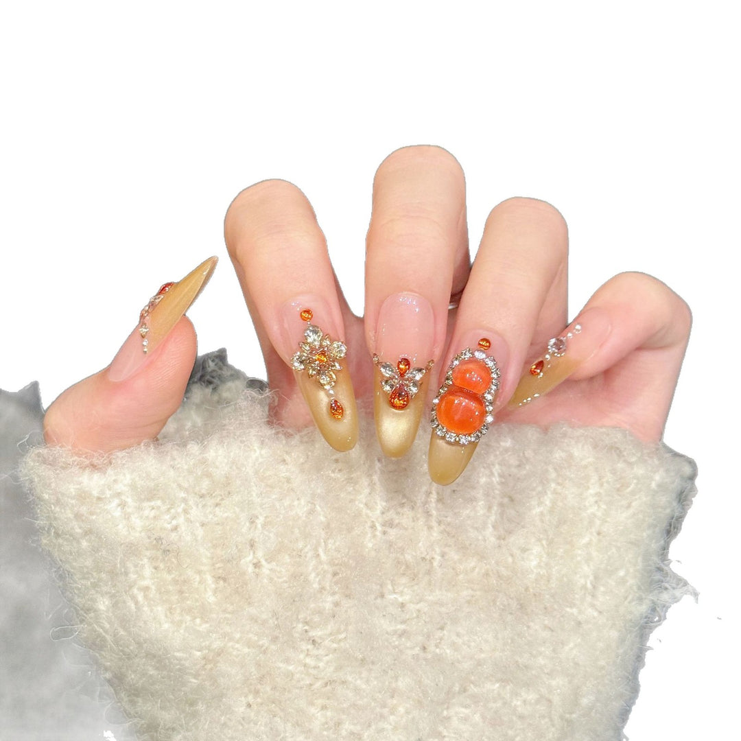 Elegantes dekoratives Press-On-Nagelkunst-Set mit Edelsteinakzenten