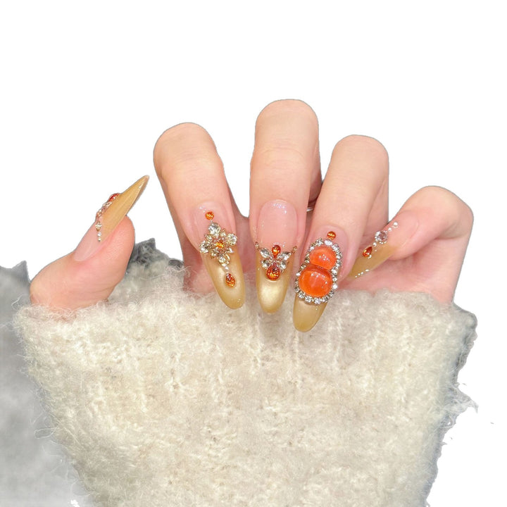 Elegantes dekoratives Press-On-Nagelkunst-Set mit Edelsteinakzenten