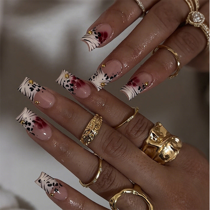 Kreatives Kunst Press-On Nagelset mit Blumen- und Zebra-Designs Karnz