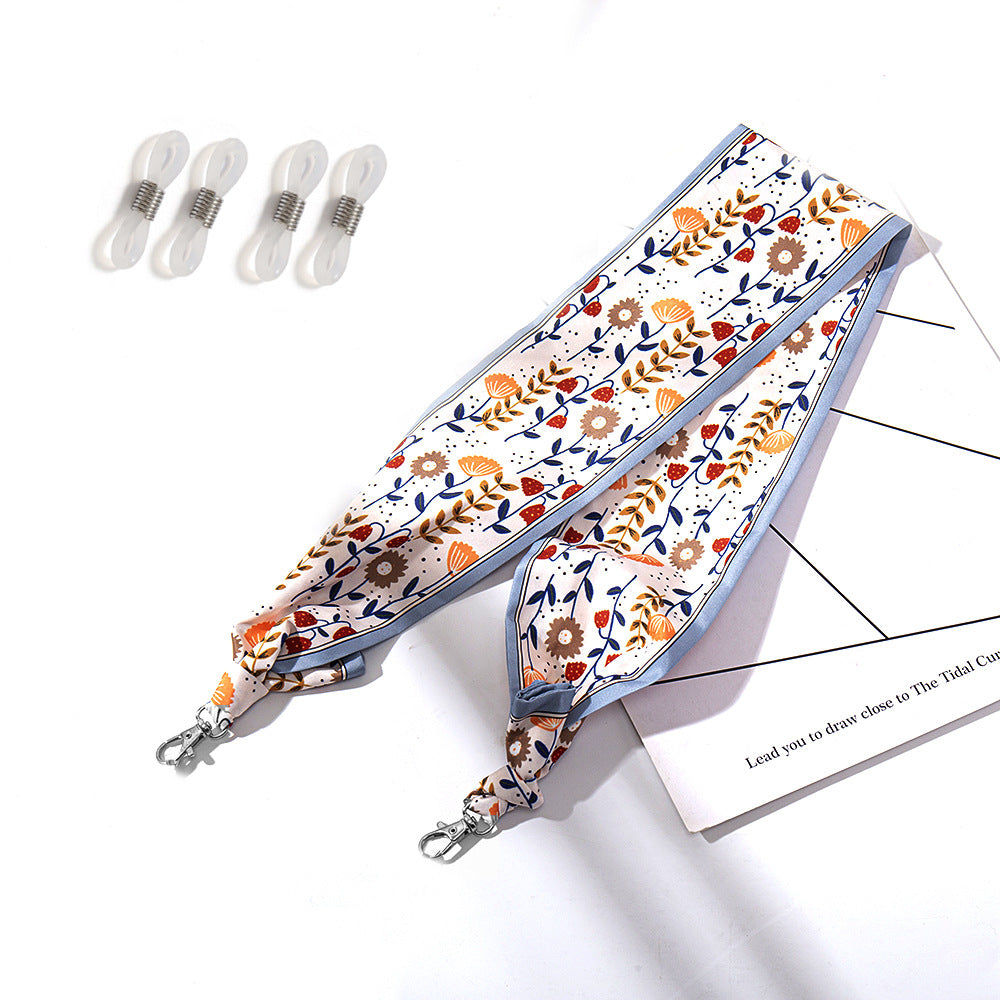 Modischer Stoffmaskenhalter mit Floralen Motiven Karnz