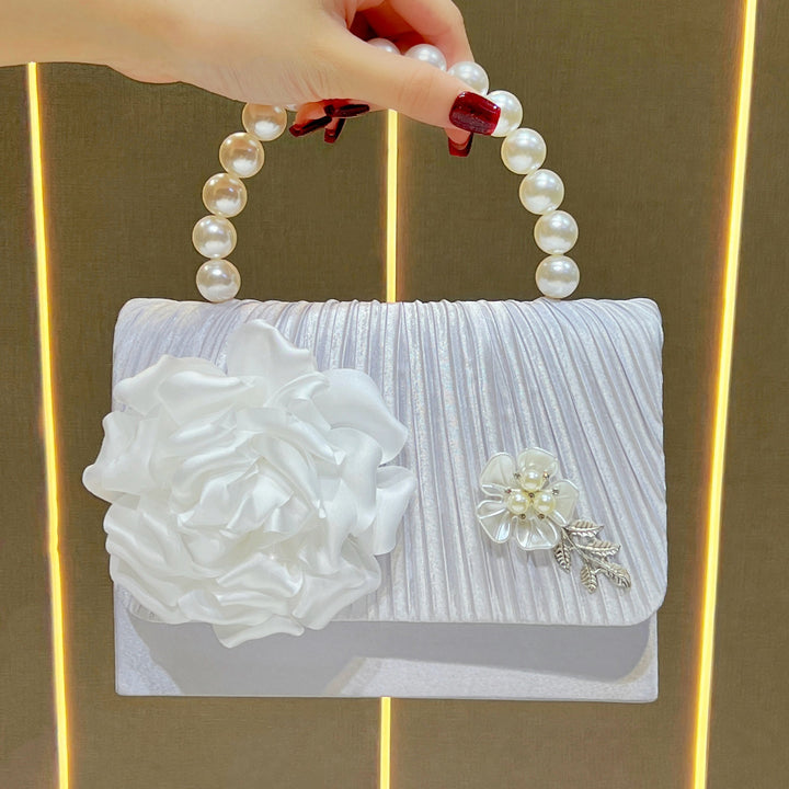 Elegante florale Abendtasche