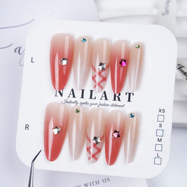 Künstlerisches Stiletto Press-On Nagelset mit floralem Schmuck Karnz