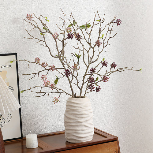 Dekorativer Kunstzweig mit detailverliebten Blüten Karnz