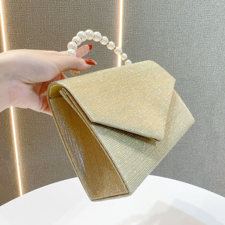 Elegante Abendtasche mit Perlengriff
