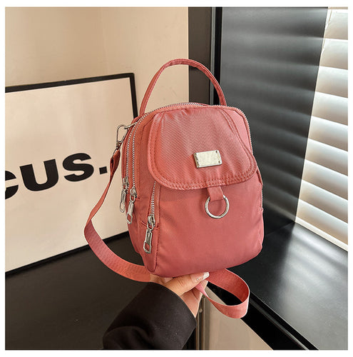 Kompakte Mini-Rucksack mit mehreren Taschen