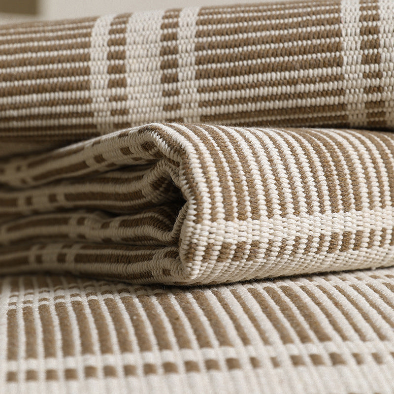 Stretch-Sofaüberwurf mit kariertem Jacquard-Muster und abnehmbaren Armlehnbezügen Karnz