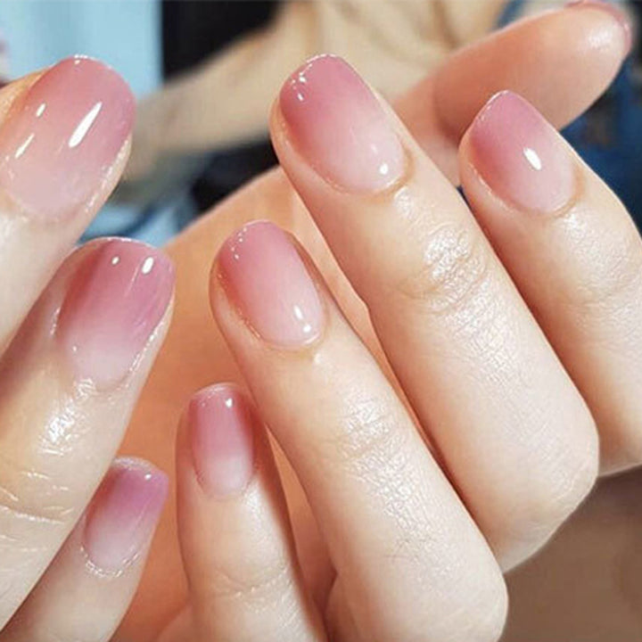 Elegante und hochglänzende Kunstnägel mit Ombre-Effekt Karnz