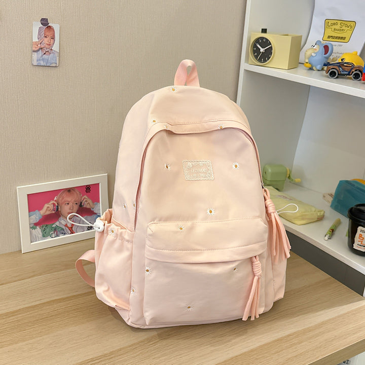 Stylischer backpack mit floralem Schmuck Karnz