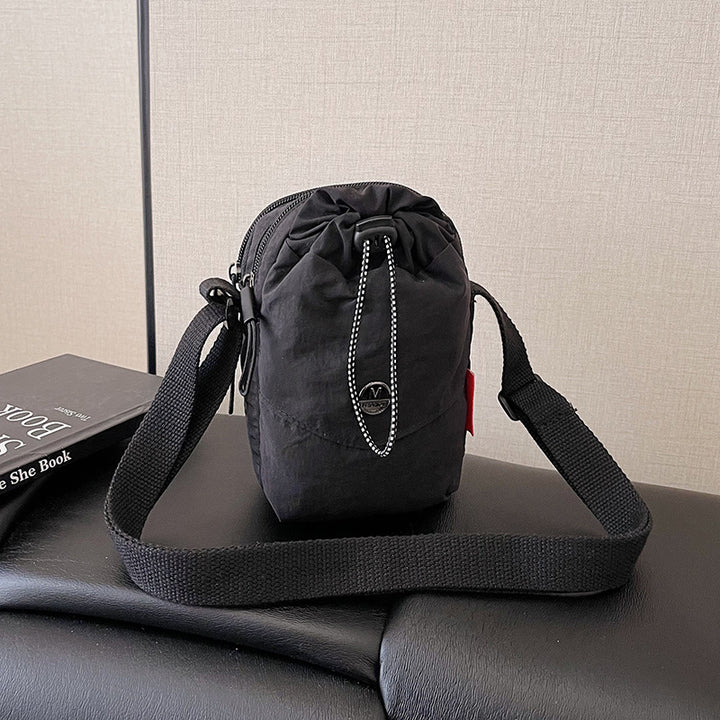 WoCompact Drawstring Crossbody Bag Karnz