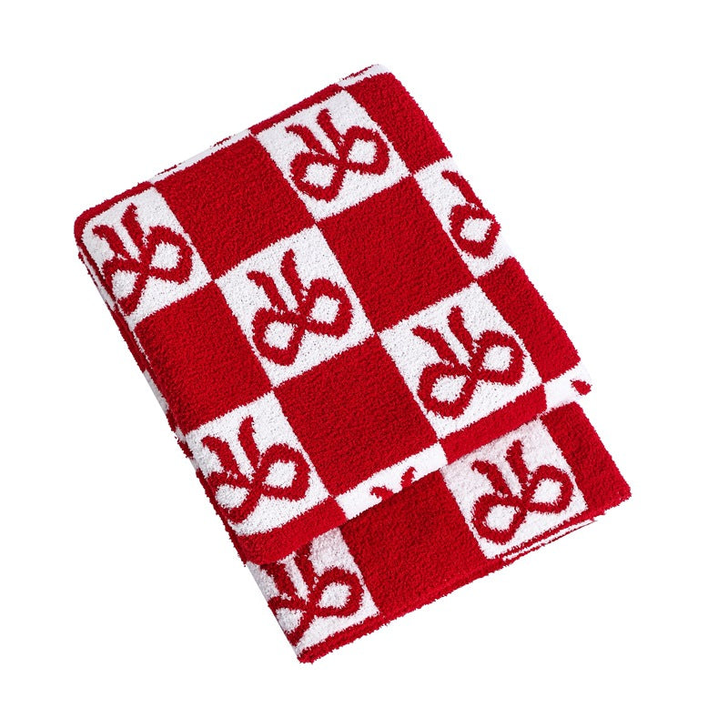 Gemütliche dekorative Strickdecke