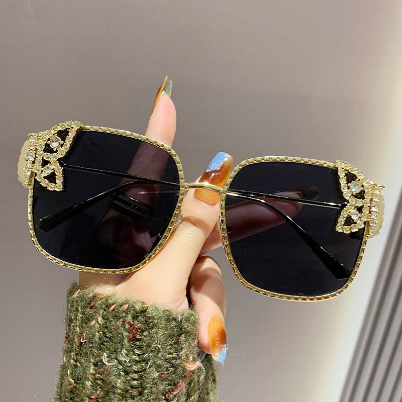 Damen extravagante Brille mit funkelnden Akzenten Karnz