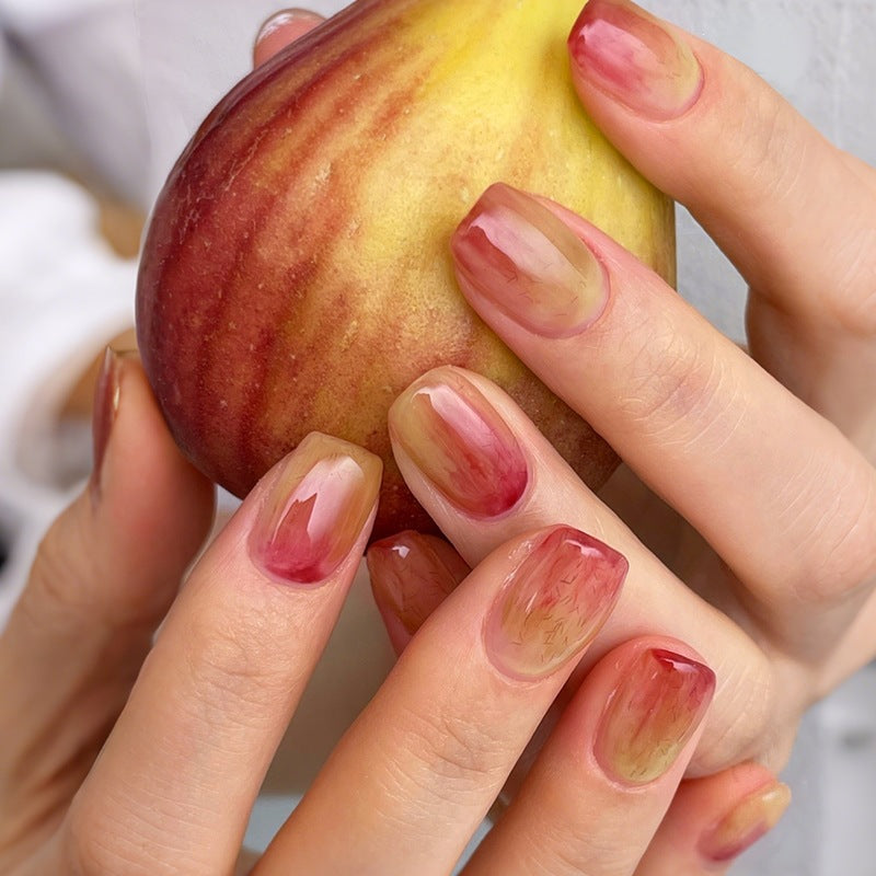 Kunstnagelset mit eleganten Farbverläufen und kreativen Akzenten Karnz