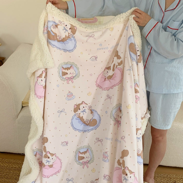 Wendbare Kuscheldecke mit Sherpa-Fleece, niedlichen Hunde-Illustrationen und kariertem Muster