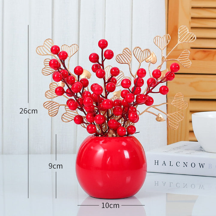 Herzförmige dekorative Blumenarrangement