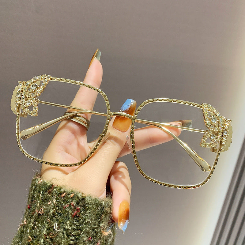 Damen extravagante Brille mit funkelnden Akzenten Karnz