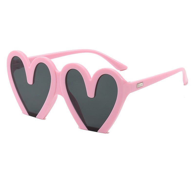 Damen Herzförmige Sonnenbrille mit auffälligem Design Karnz