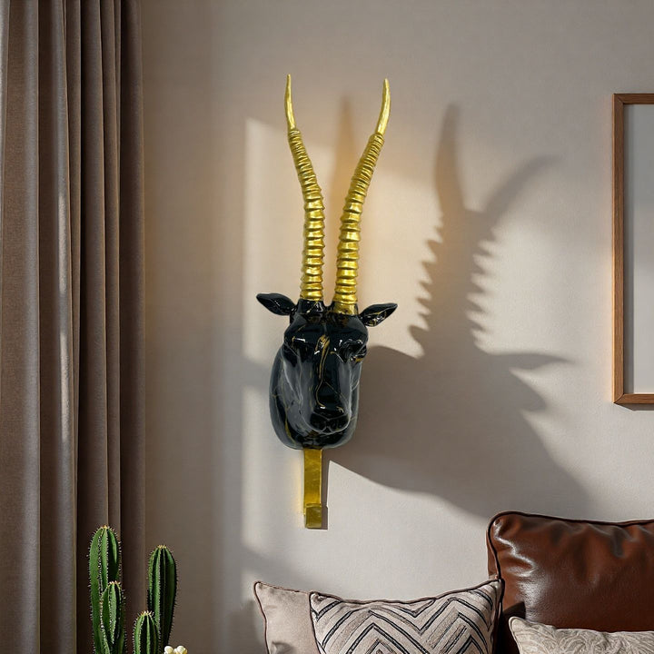 Wandhaken in Form eines stilisierten Einhorns Karnz