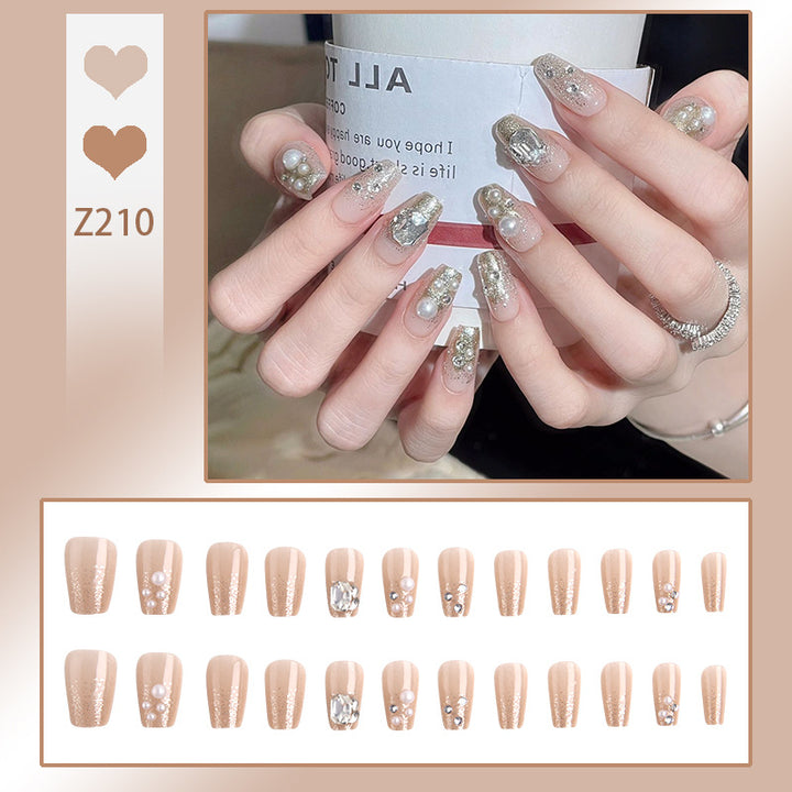 Kunstnagelset mit elegantem Perl- und Glitzerdesign Karnz