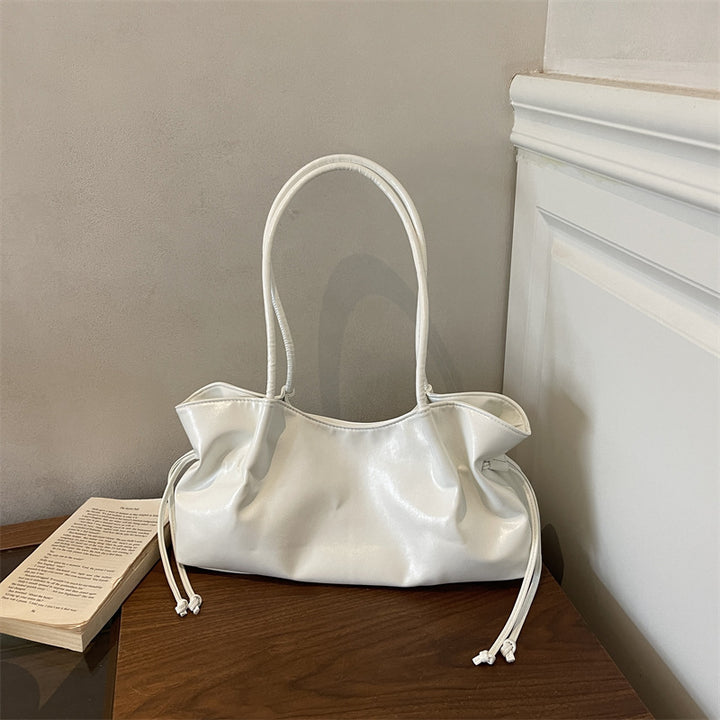 Glänzende Kunstleder-Handtasche
