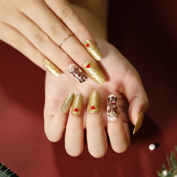 Elegante Acryl-Nägel mit goldenen Akzenten Karnz