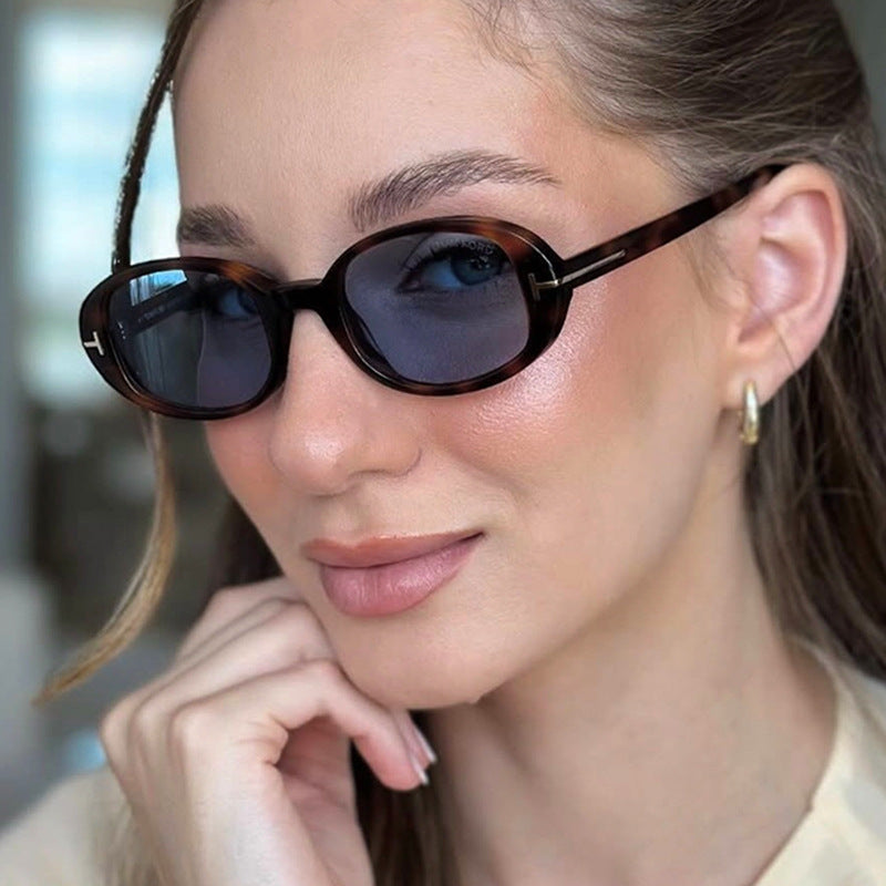 Damen stilvolle ovale Sonnenbrille mit goldenen Details Karnz