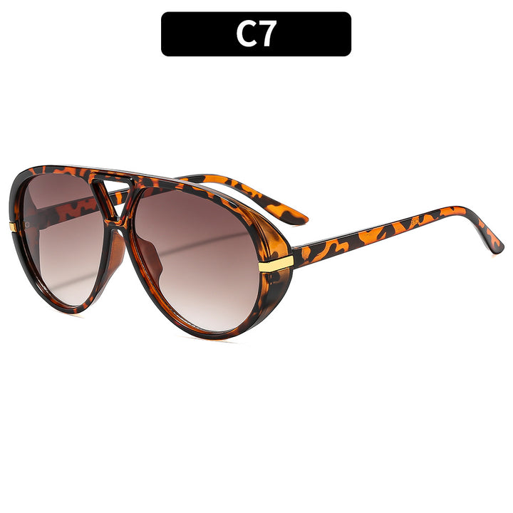 Oversized Shield-Sonnenbrille mit dekorativen Akzenten