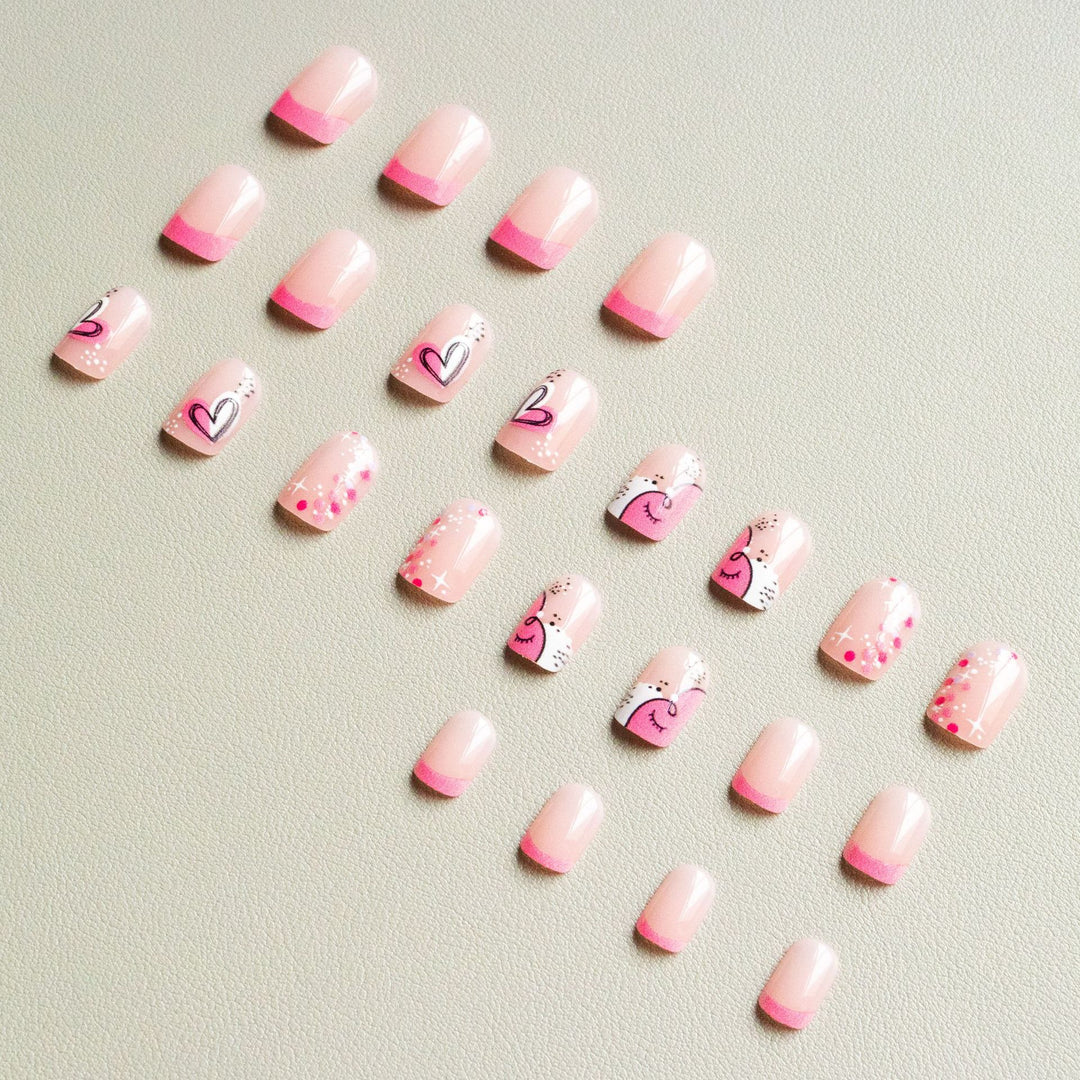 Künstlerisches Nail Art Kit mit Herz- und Funkeldesigns