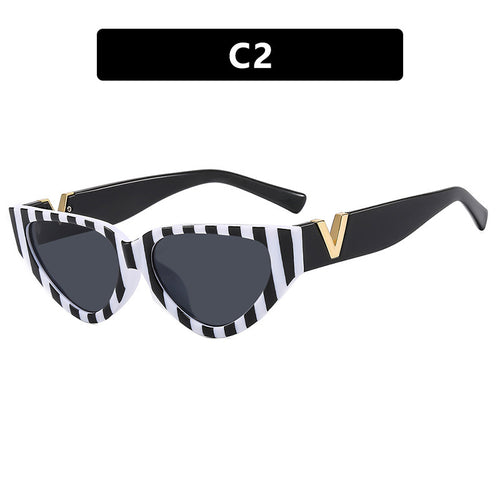 Damen Cat-Eye Sonnenbrille mit modernem Streifenmuster und elegantem Akzent Karnz