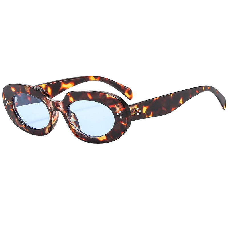 Damen modische Sonnenbrille mit einzigartigem ovalen Rahmen und schützenden Gläsern Karnz