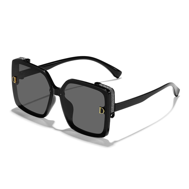Damen Designer-Sonnenbrille mit luxuriösem Rahmen und glitzernden Details Karnz